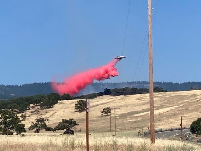 Memorial Fire east of Ashland fully lined within 2 hours on July 19
