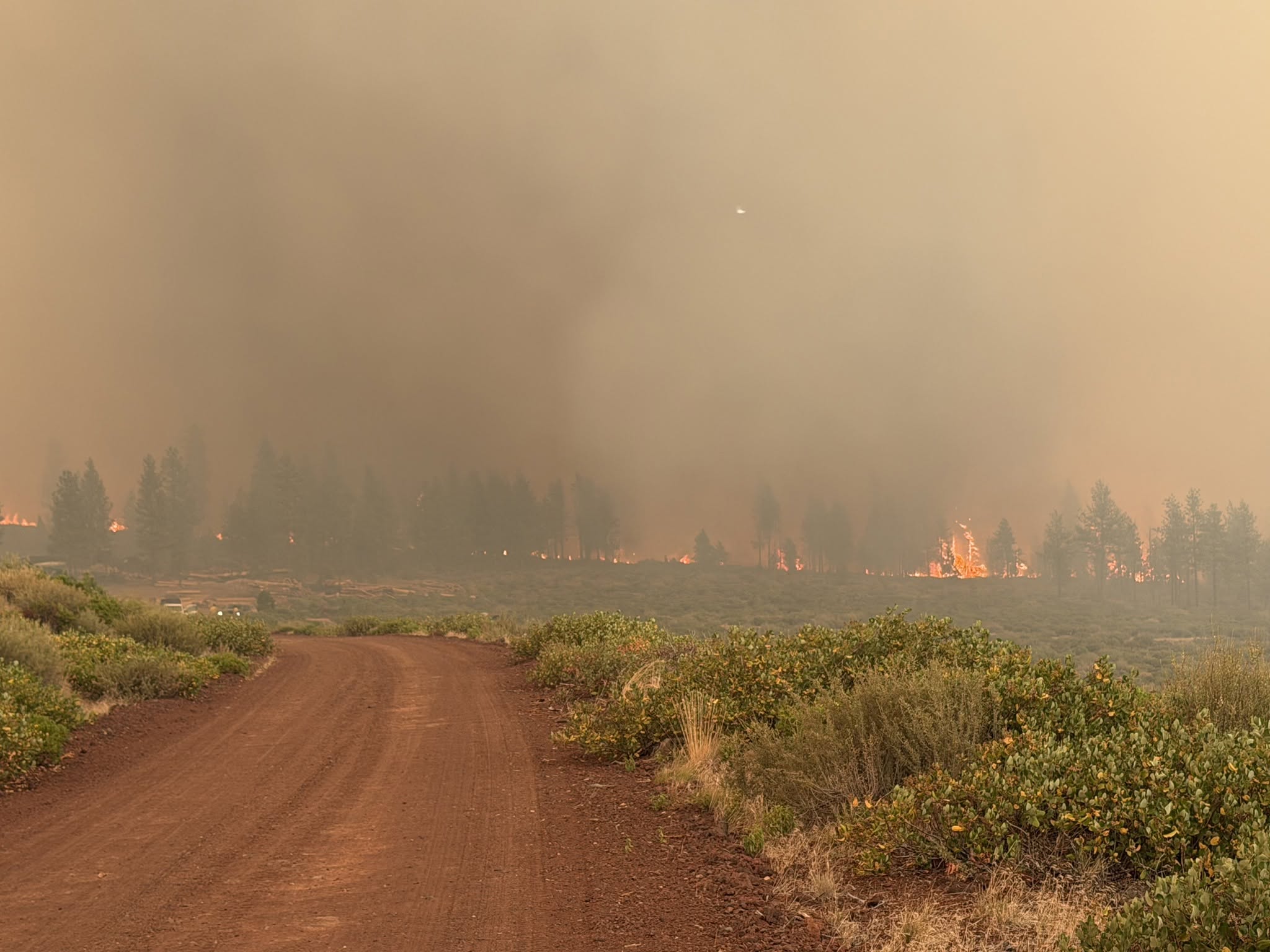 Akawa Butte Fire 7-21-26 Fire in the distance with heavy smoke on the Akawa Butte Fire.